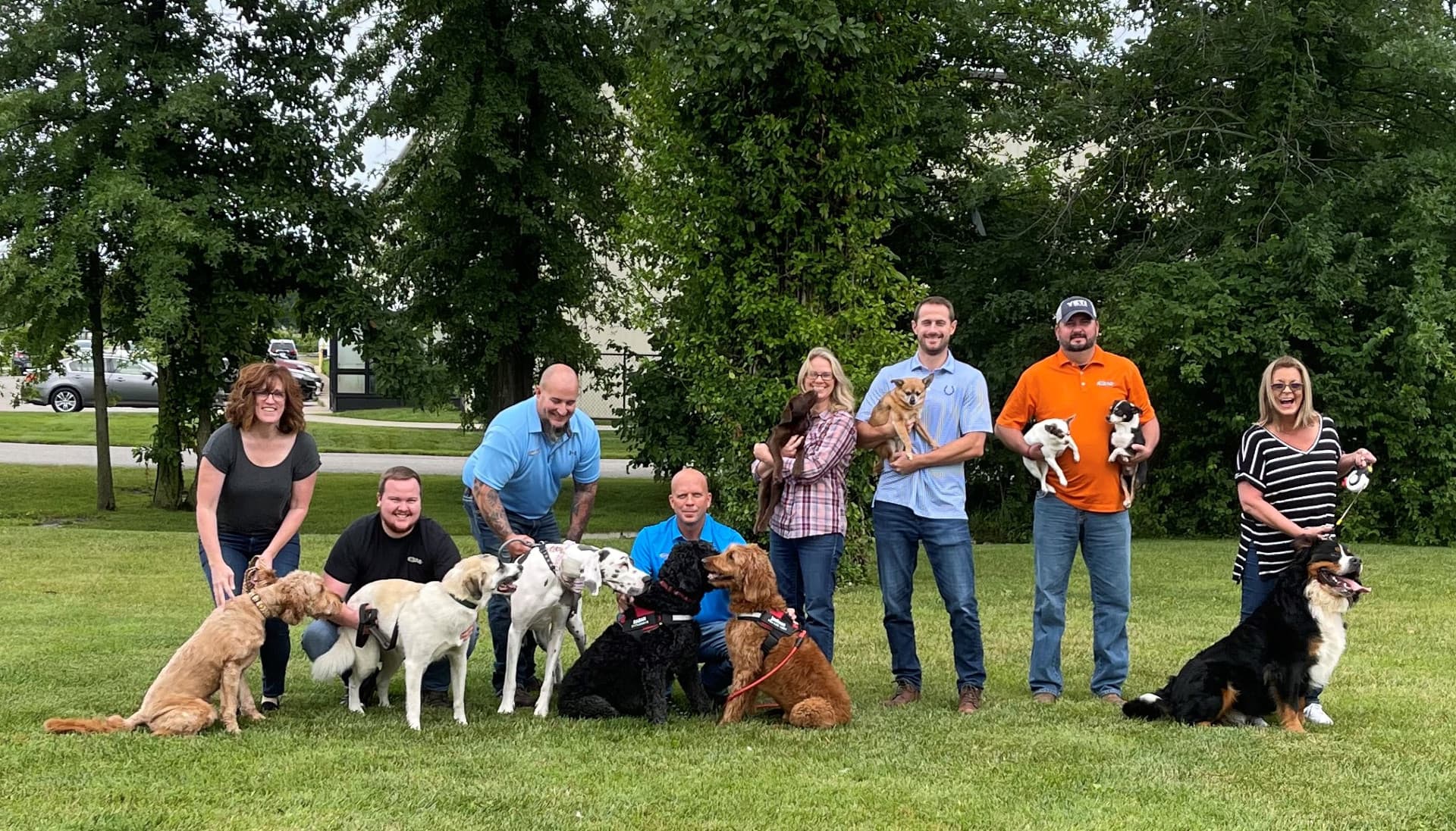 The Commercial Air team with their dogs.